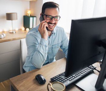 A recruiter on a call at their desk