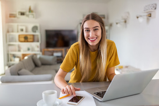 A recruiter working at a laptop
